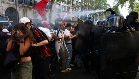 Mass Protest in France: Police Fire Tear Gas in Paris